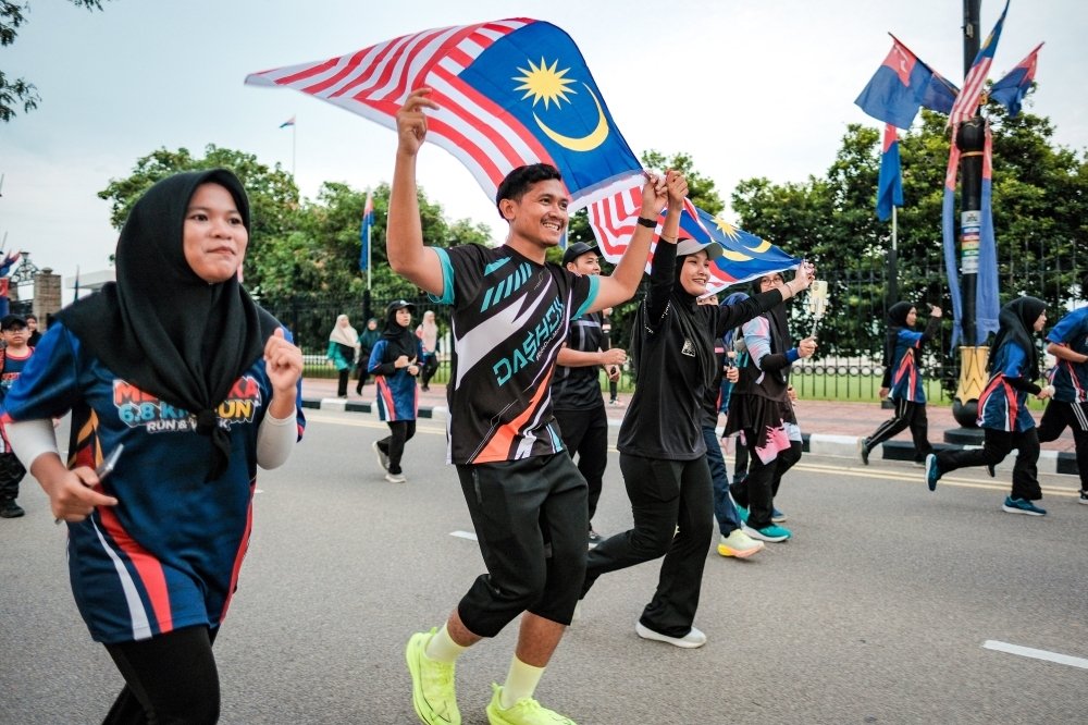‘Fly It Proudly’: Fahmi Urges Malaysians to Display Jalur Gemilang for Unity and Patriotism